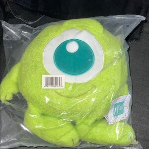 Green Plush Toy with Blue Eye